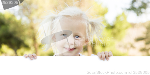 Image of Cute Little Girl Holding White Board with Room For Text
