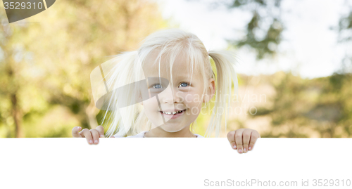 Image of Cute Little Girl Holding White Board with Room For Text