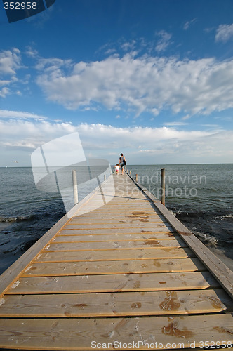 Image of Mother and child walking