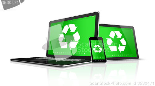 Image of Laptop tablet PC and smartphone with a recycling symbol on scree