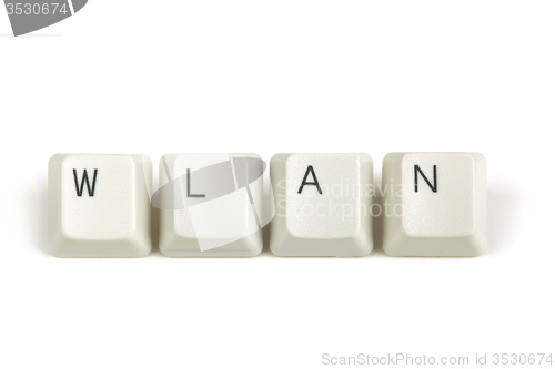 Image of wlan from scattered keyboard keys on white