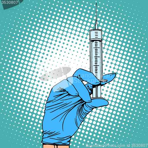 Image of Hand with a syringe injection vaccination medicine