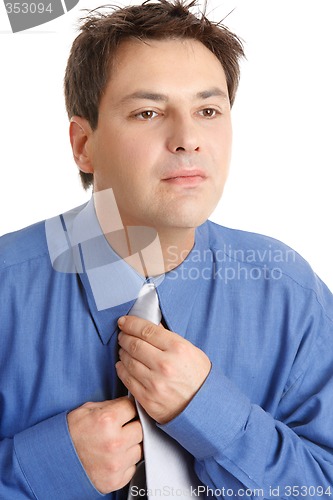 Image of Business man dressing for work