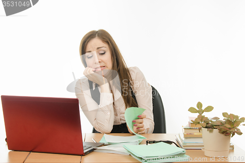 Image of Teacher with horror looks in a notebook student