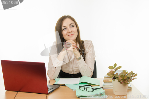 Image of The teacher looked at the table right