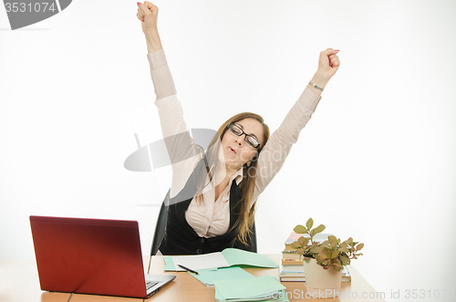 Image of Teacher stretches sitting at your desk