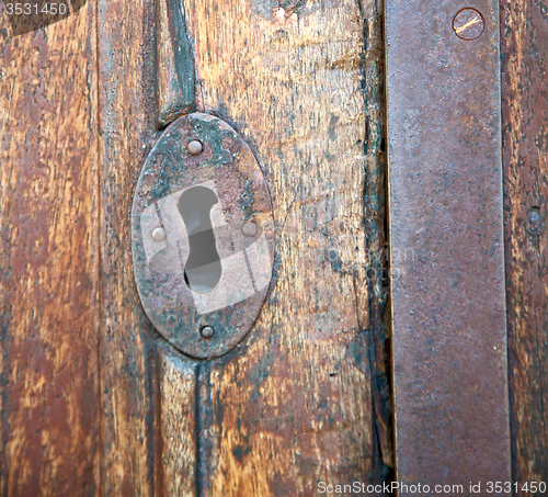 Image of  traditional   door    in italy   ancian wood and traditional  t