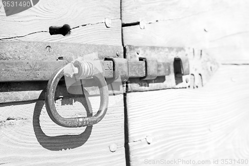 Image of europe old in  italy  antique close brown door and rusty lock  c