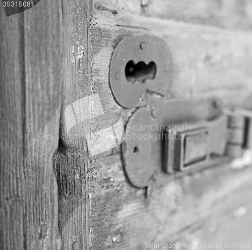 Image of europe old in  italy  antique close brown door and rusty lock  c