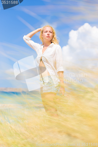 Image of Free Happy Woman Enjoying Sun on Vacations.