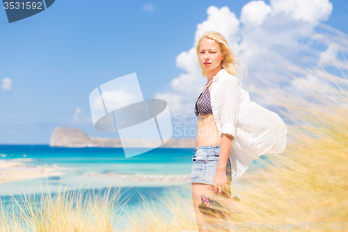 Image of Free Happy Woman Enjoying Sun on Vacations.