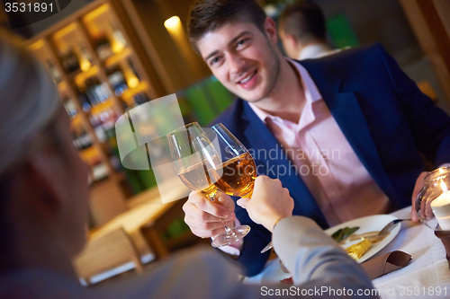 Image of business couple having dinner