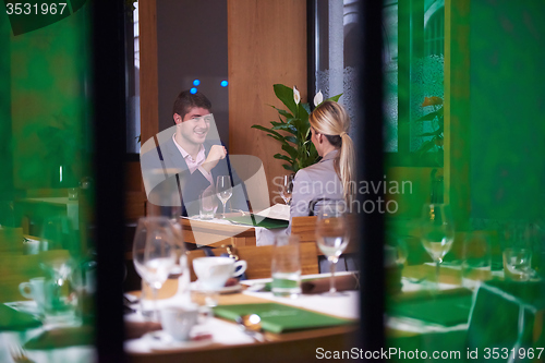 Image of business couple having dinner