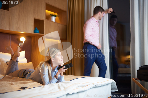 Image of young couple in modern hotel room