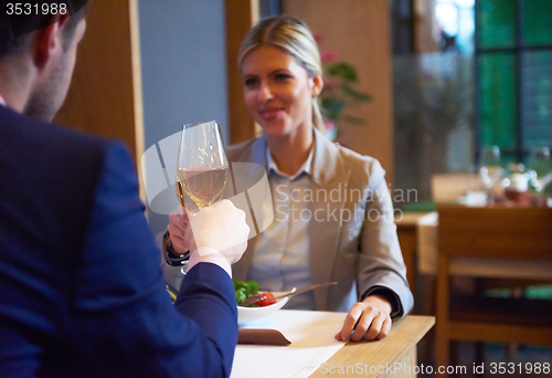 Image of business couple having dinner