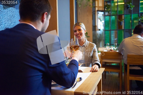 Image of business couple having dinner