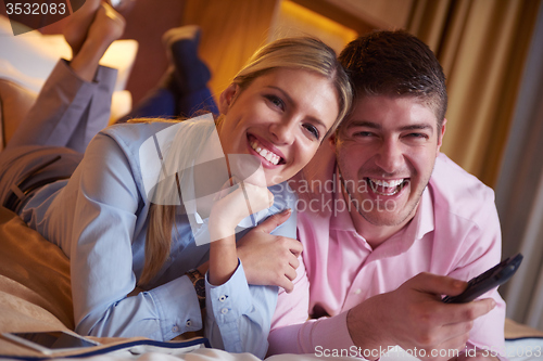 Image of young couple in modern hotel room