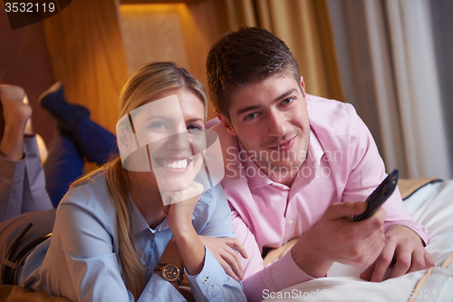 Image of young couple in modern hotel room