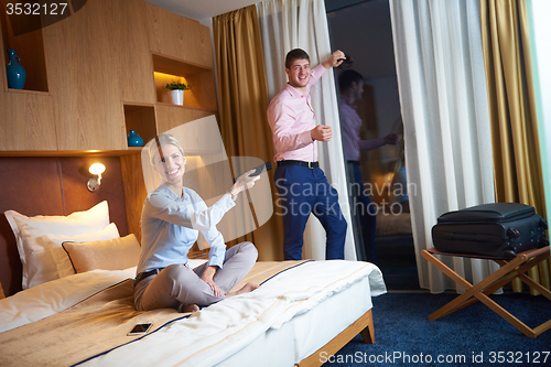 Image of young couple in modern hotel room