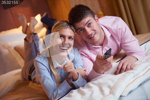 Image of young couple in modern hotel room