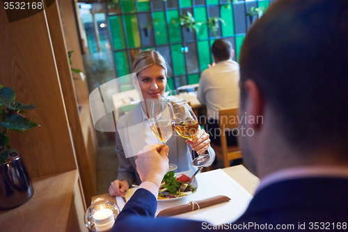 Image of business couple having dinner