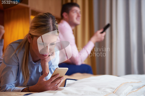 Image of young couple in modern hotel room