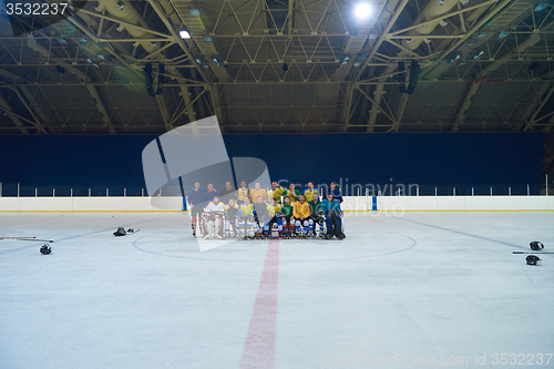 Image of ice hockey players team meeting with trainer