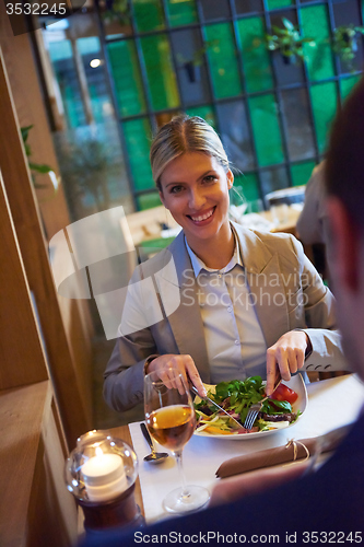 Image of business couple having dinner