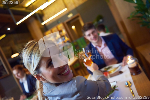 Image of business couple having dinner