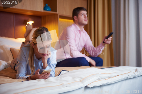 Image of young couple in modern hotel room
