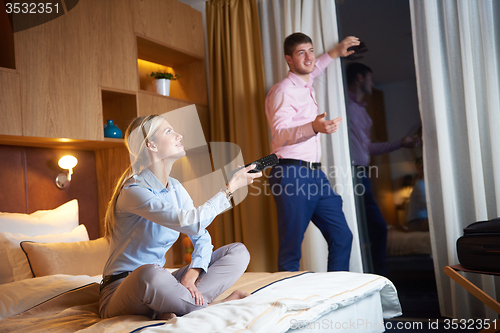 Image of young couple in modern hotel room