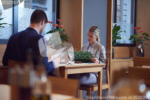 Image of business couple having dinner