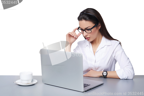 Image of Business woman working online on a laptop