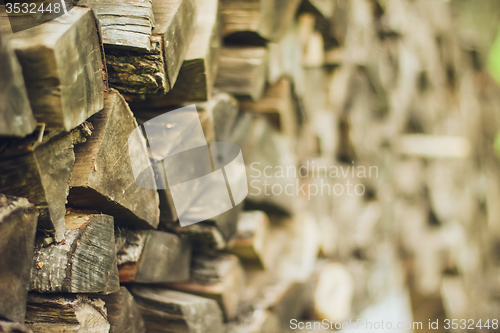 Image of A stack of firewood close up 