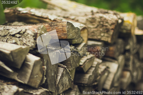 Image of A stack of firewood close up 