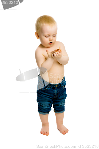 Image of Curious baby boy. Full length. Studio. isolated