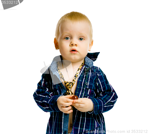 Image of baby boy in a plaid shirt and a tie. isolated