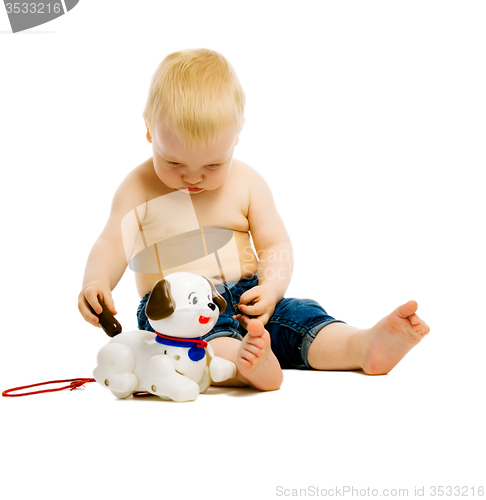 Image of Baby boy playing with toys. isolated