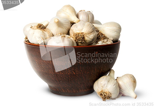 Image of Whole head of garlic in ceramic bowl