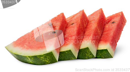 Image of Several slices of watermelon stacked ladder
