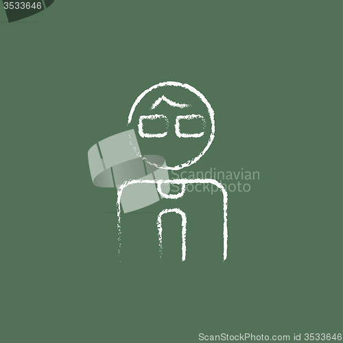 Image of Businessman icon drawn in chalk.