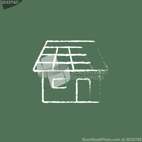 Image of House with solar panel icon drawn in chalk.