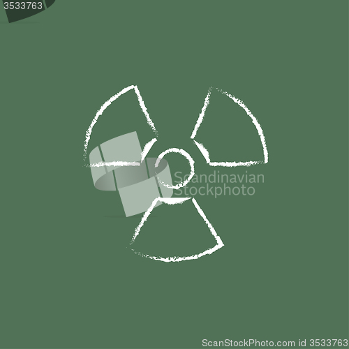 Image of Ionizing radiation sign icon drawn in chalk.