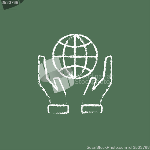 Image of Two hands holding globe icon drawn in chalk.