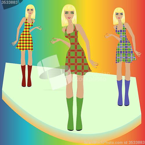 Image of Fashion blond models posing on podium in checkered dresses