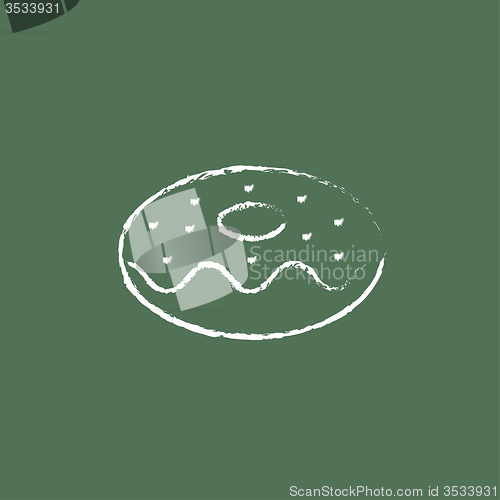 Image of Doughnut icon drawn in chalk.