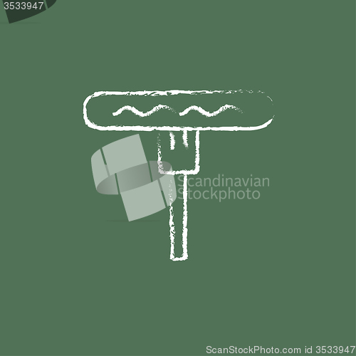 Image of Sausage on the fork icon drawn in chalk.