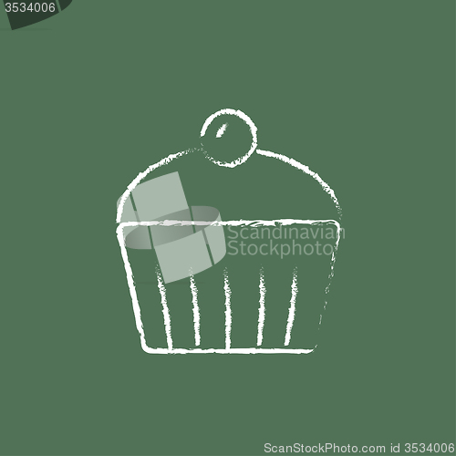 Image of Cupcake with cherry icon drawn in chalk.