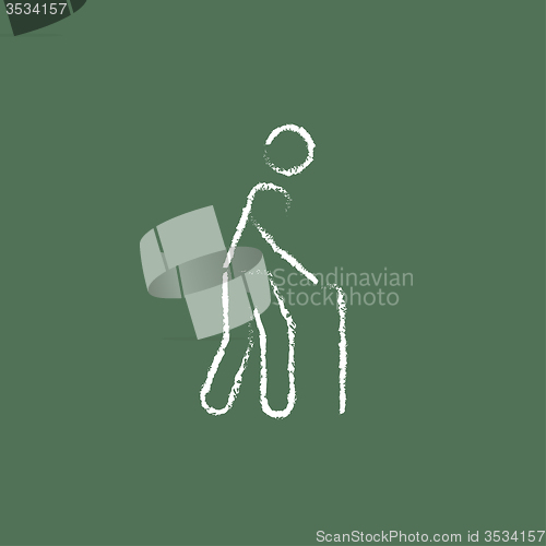 Image of Man with cane icon drawn in chalk.