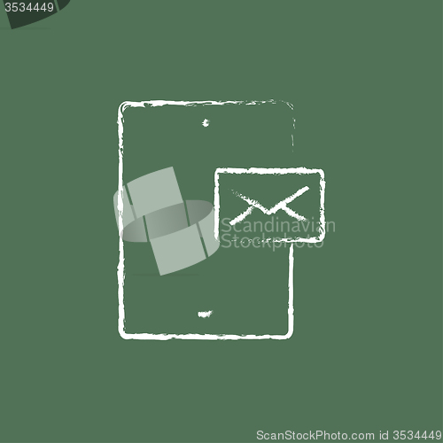 Image of Touch screen phone with message icon drawn in chalk.
